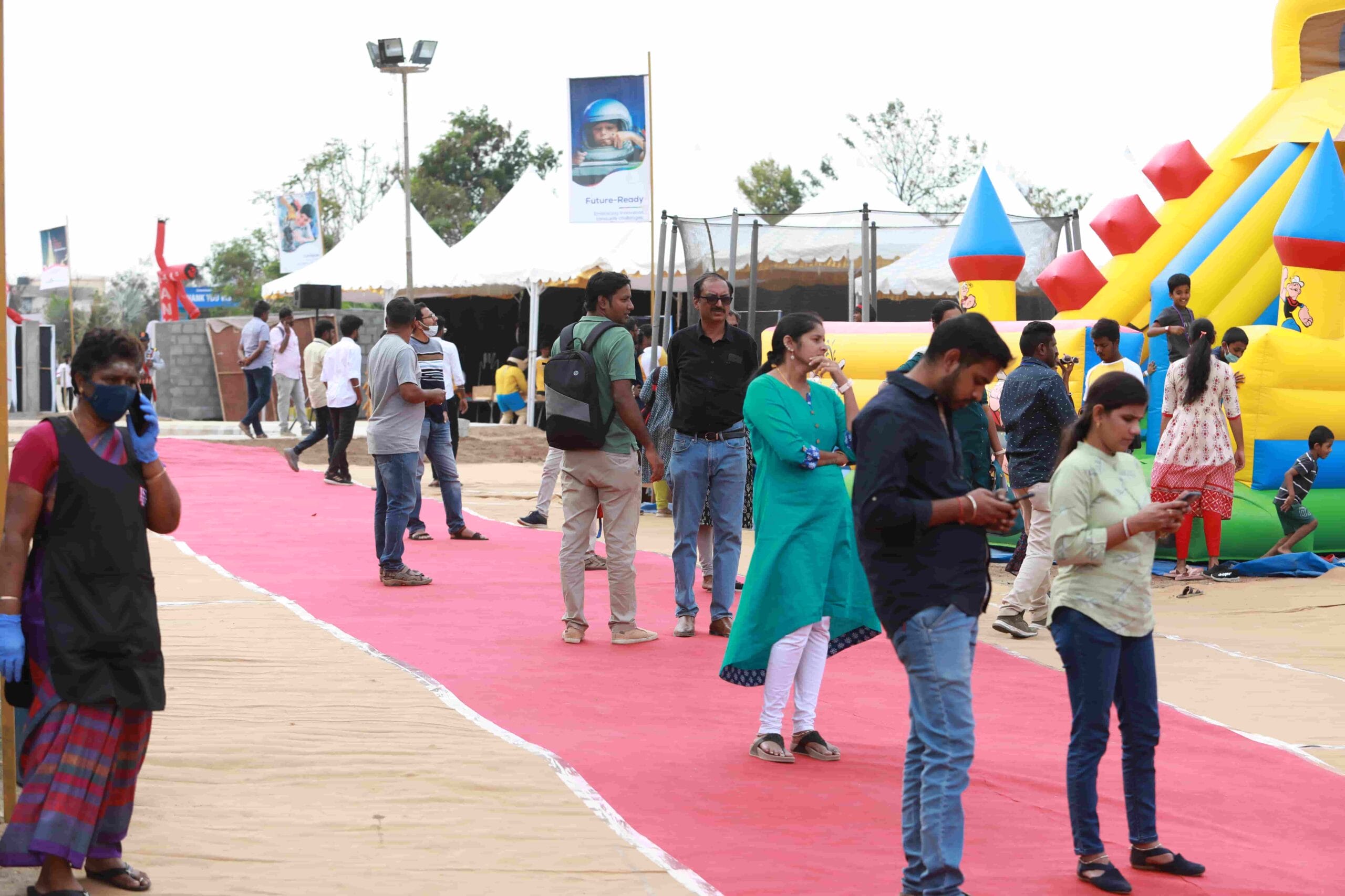 Image of parents with children in the fest.