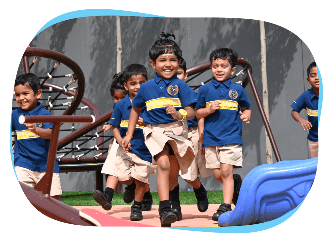 Happy students running in the playground.