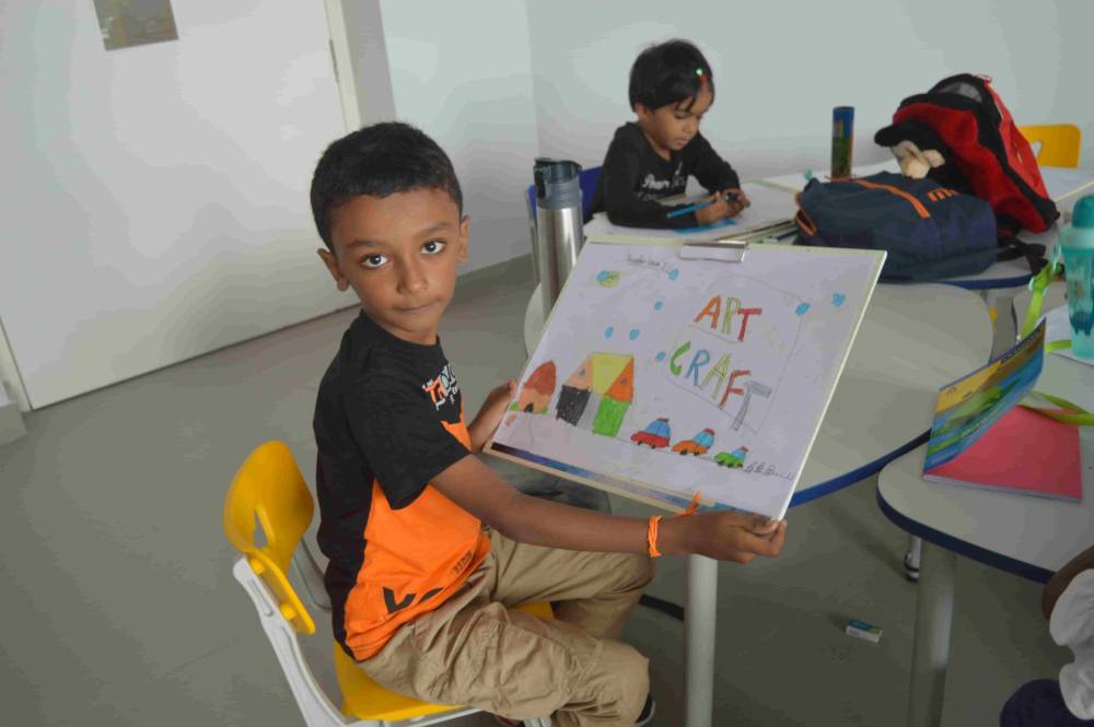 A CMIS school student with his beautiful drawing.