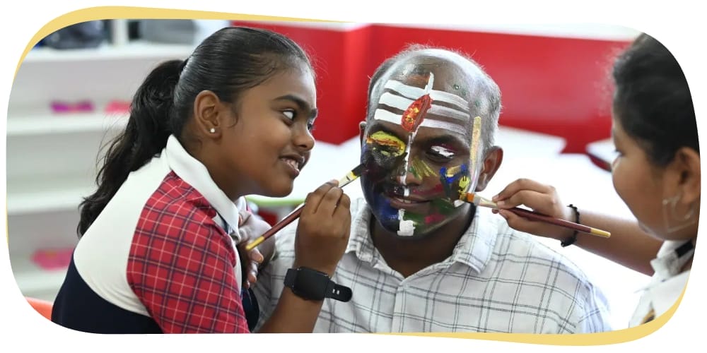 Fathers Day at CMIS: students and fathers engaging in creative tasks.