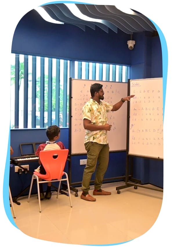 Music class at CMIS where students learn and express creativity through music.