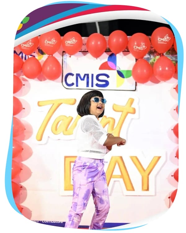 Student performing confidently on Talent Day showcasing creativity and stage skills.