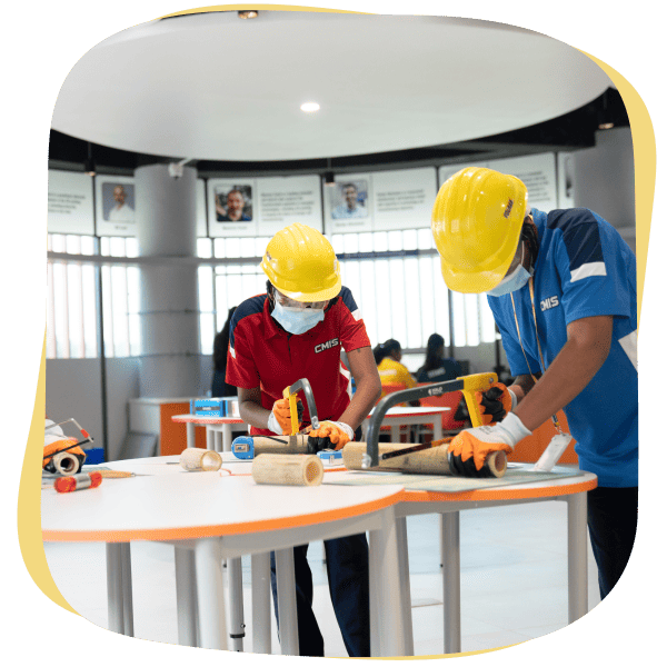 Students at CMIS developing 21st century skills in a practical workshop