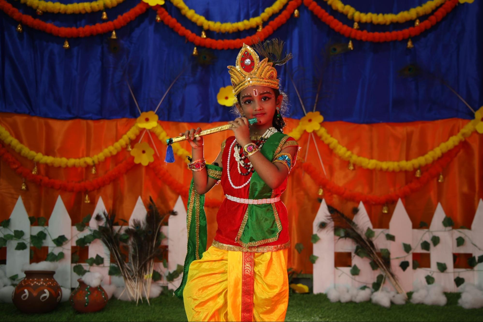 CMIS Krishna Janmashtami 2025 student dressed as Lord Krishna.